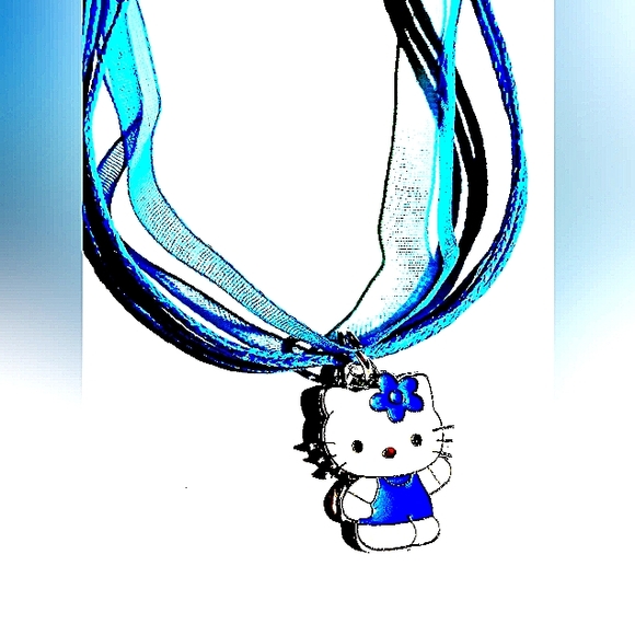SOLD .......SOLD...,,......All In Blue Charm On A Blue Layered Ribbon Necklace - Picture 5 of 6